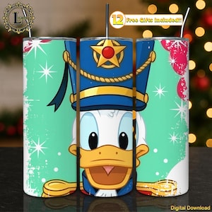 May include: A set of three stainless steel tumblers featuring a cartoon Donald Duck design. The design includes Donald Duck in a blue and gold military-style hat. The tumblers have a straw and the text "12 Free Gifts Included!!". The background is a light green color with white stars.