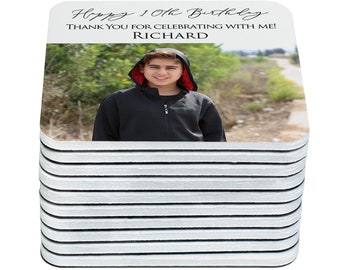 May include: A stack of white coasters with black trim, featuring a photo of a young person with the text "Happy 10th Birthday Thank you for celebrating with me! RICHARD"