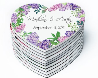 May include: A stack of heart-shaped wedding favors with a floral design and the text "Madison & Austin September 11, 2021".