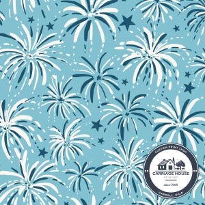 May include: A repeating pattern of white and navy blue fireworks and stars on a light blue background. The design includes a circular logo with the text "Custom Print Shop, Carriage House Printery, since 2018, Carroll, Ohio."