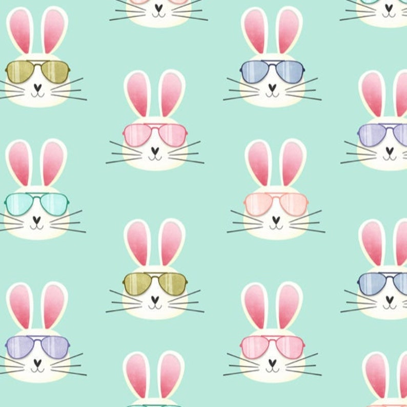 May include: A seamless pattern featuring white bunnies wearing sunglasses in various colors on a light blue background. The bunnies have pink ears and whiskers.