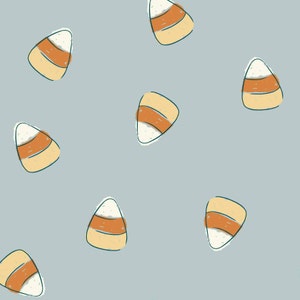 May include: A seamless pattern of candy corn on a light blue background. The candy corn is drawn in a cartoon style with orange, yellow, and white stripes.