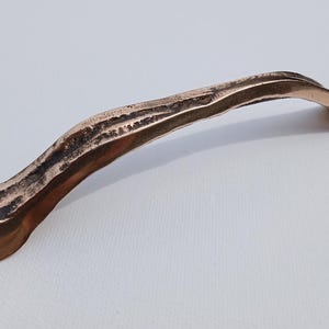 Solid bronze sand-cast handles