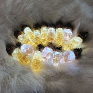 Luminous crystal pendants made of resin - "Orange Inclusion" series