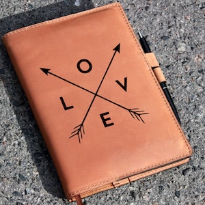 Leather notebook cover handcrafted to the size of your notebook which you can personalize with engraving of any image and your name