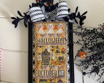 Patrón de punto de cruz de Halloween: Una larga historia