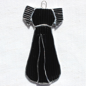 Small stained-glass dog, black textured