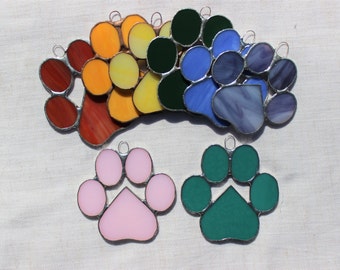 Small stained-glass paw print with heart shape, multiple colors