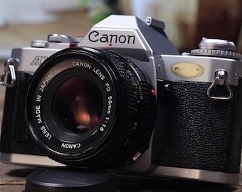 素晴らしいキヤノン AV-1 35 MM 一眼レフカメラ、キヤノン 1.1.8 50 mm 素晴らしいキヤノン AV-1 35 MM 一眼レフカメラ、キヤノン 1.1.8 50 mm