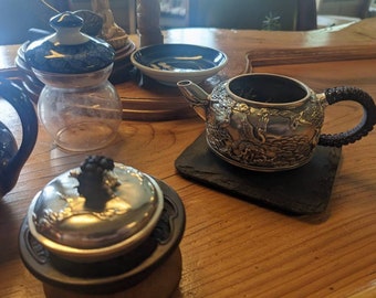 Pure Silver .999 Teapot for Gong Fu Tea Brewing.  Expertly crafted in Yunnan (Qujing County) this pure silver teapot is absolutely beautiful