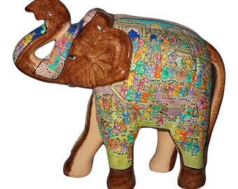 Handmade paper mache elephant with trunk up by Rumikrafts