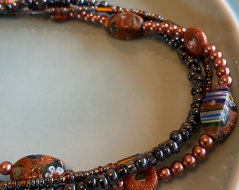 Necklace with Millefiori Sparkly Rust Color Beads