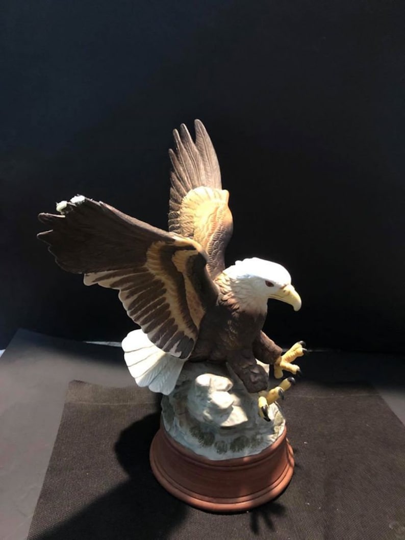 Vintage United China Bald Eagle Figurine Price reduced due to damage on wings.