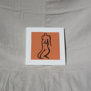 Orange Woman Lounging