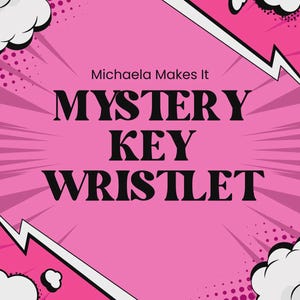 May include: A rectangular graphic with a vibrant pink background featuring black comic book style halftone dots and white speech bubble shapes. The text Michaela Makes It MYSTERY KEY WRISTLET is printed in black, bold, serif and sans-serif fonts.