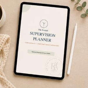 May include: A digital tablet displays "The Rooted Supervision Planner" with text: "Compassionate + Competency-Based Supervision." A white stylus and a cup of coffee are next to the tablet. A beige knitted scarf and a sprig of greenery are also in the image.
