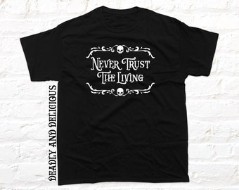 Never Trust The Living T-shirt in a gothic style. Alternative goth quote gift made from black cotton. Handmade design.