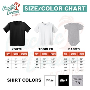 May include: Size and color chart for youth, toddler, and baby shirts. The chart includes measurements in inches for width and length. Shirt colors available are white, black, and heather gray. The brand name is Pacific Dream Studios.