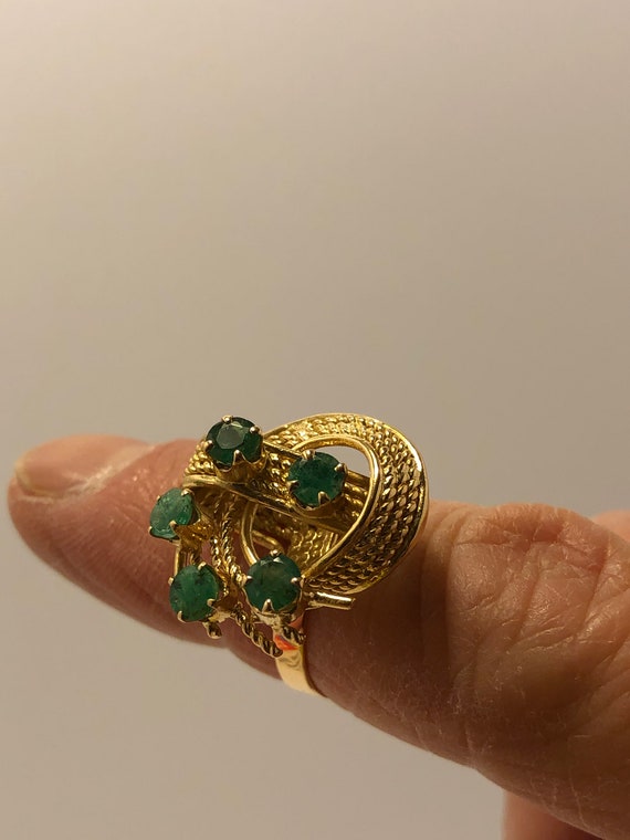18K gold retro diamond and emerald cluster ring.