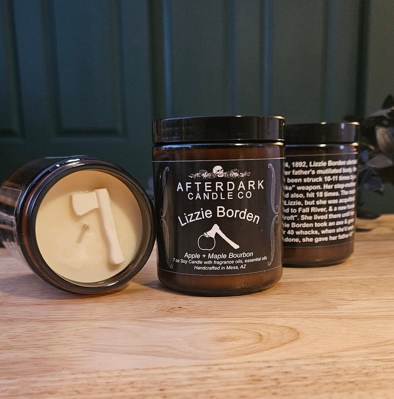 Lizzie Borden story candle with a wax axe on top that melts when lit. Made from soy wax and a small amount of beeswax. Hand crafted in small batches.