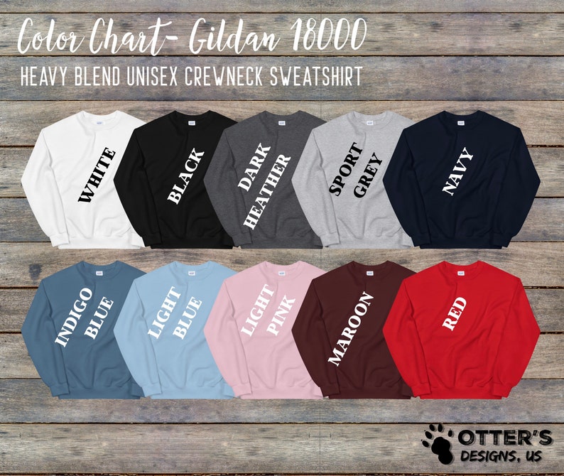 Puede incluir: Carta de colores que muestra 11 colores diferentes de sudaderas con cuello redondo unisex de mezcla pesada Gildan 18000. Los colores son blanco, negro, gris oscuro jaspeado, gris deportivo, azul marino, azul &iacute;ndigo, azul claro, rosa claro, granate y rojo.