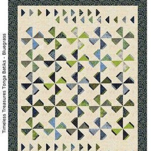 May include: A quilting pattern called "Cloverleaf" by Marlou Designs. The pattern features a geometric design with green, blue, and white fabric squares. The pattern is for a quilt that can be made in lap, twin, double, and queen sizes. The pattern is for stash busting with precuts - 5" squares.