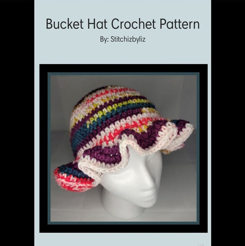 May include: A colorful crocheted bucket hat with a ruffled brim. The hat is made with pink, purple, teal, yellow, and white yarn.