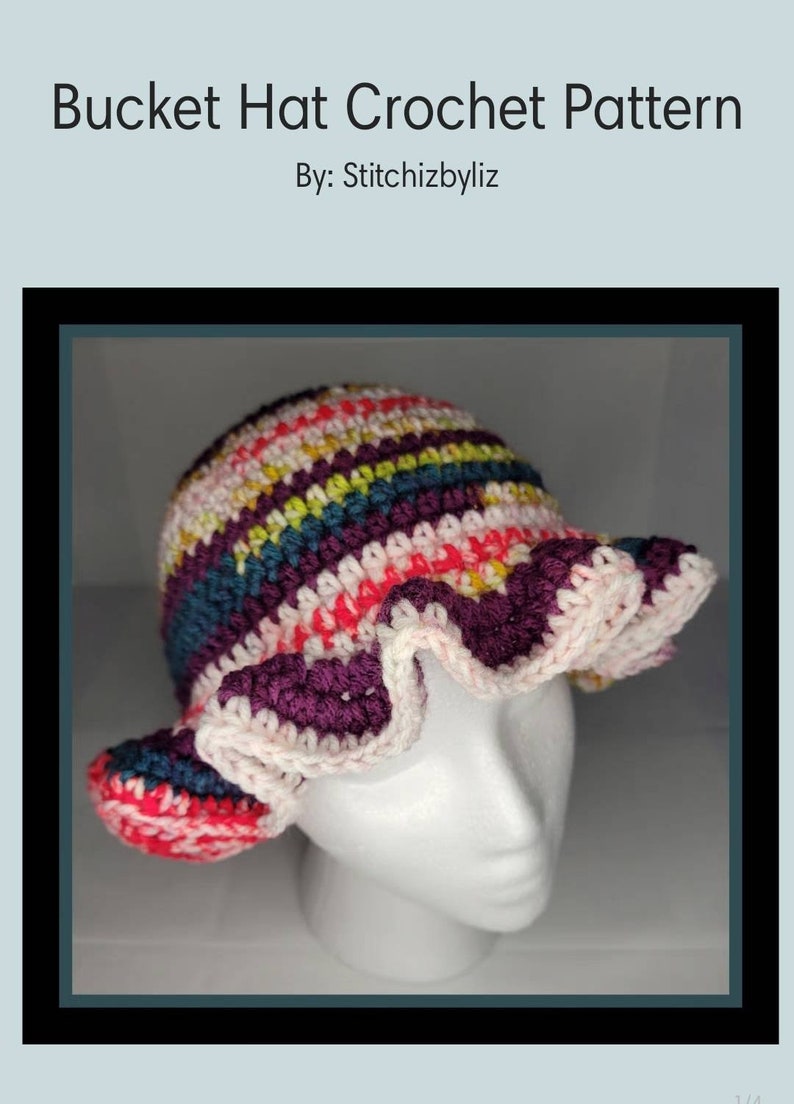 May include: A colorful crocheted bucket hat with a ruffled brim. The hat is made with a variety of colors, including pink, red, purple, blue, and green.