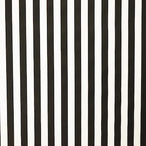 May include: Black and white striped pattern. The stripes are vertical and evenly spaced.