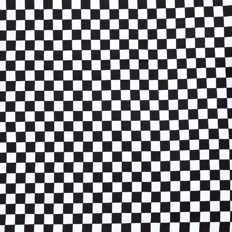 May include: Black and white checkered pattern. The pattern is made up of squares.