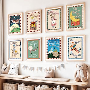 May include: A collection of framed nursery rhyme prints, including "The Cow Jumped Over the Moon" and "Little Bo Peep." Each print features colorful illustrations and text, displayed above a wooden bench with decorative pillows and baskets.
