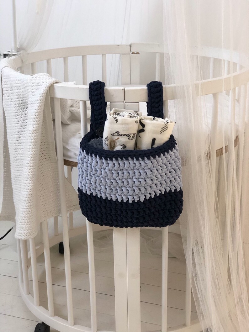 Handmade knitted hanging basket for a child bedroom