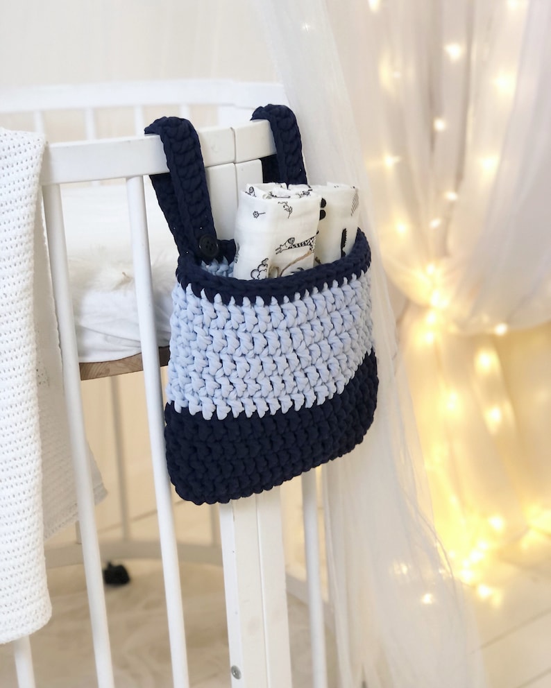 Handmade knitted hanging basket for a child bedroom