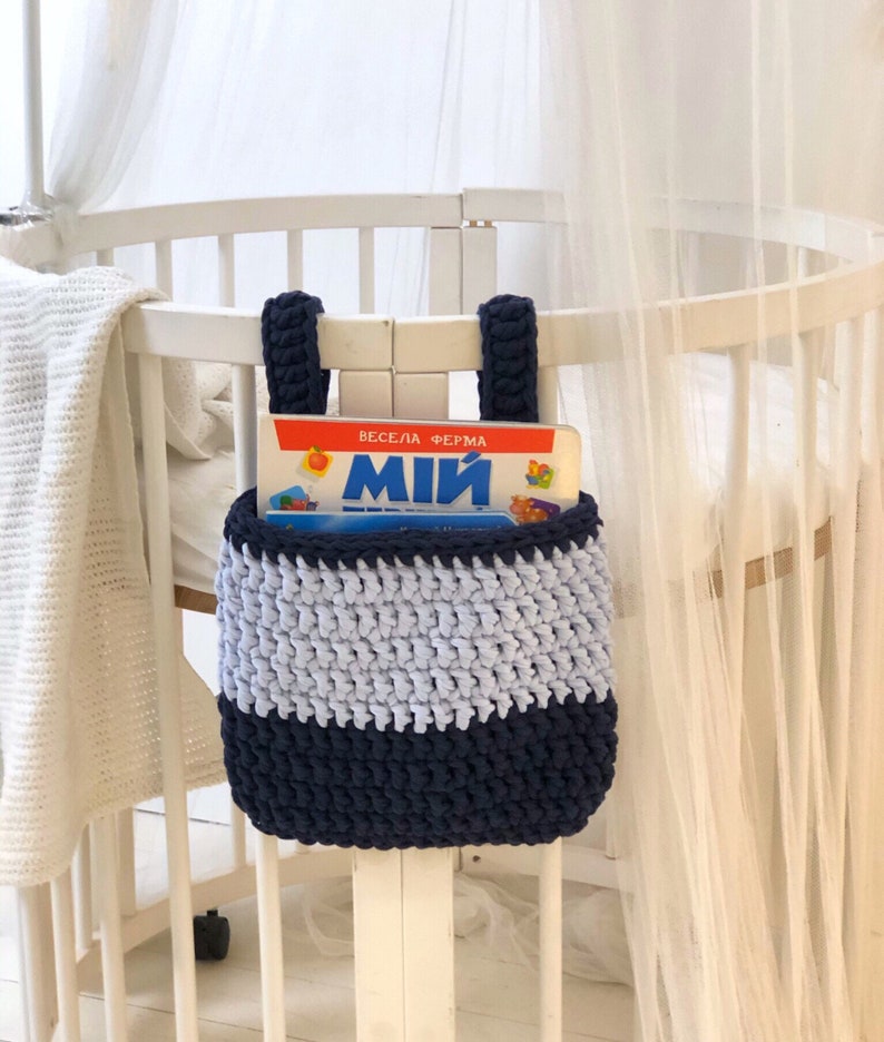 Handmade knitted hanging basket for a child bedroom