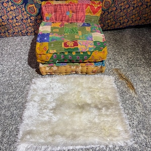 May include: A set of three ceramic mugs with a speckled, matte finish. The mugs are in shades of cream, light gray, and dark gray. Each mug has a simple, modern design and a rounded handle. Perfect for coffee or tea.