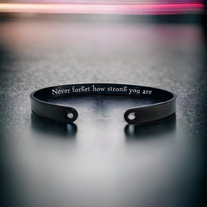 Never forget how strong you are - Motivational bangle with a hidden message, with/without cut-heart detail