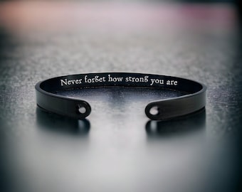 Never forget how strong you are - Motivational bangle with a hidden message, with/without cut-heart detail