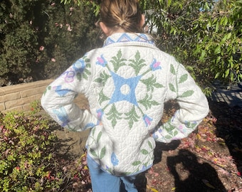 Flowered cross stitched coat