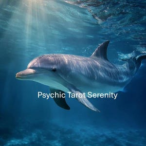 May include: A gray dolphin swims underwater in a blue ocean, with sunlight filtering down from above. The text "Psychic Tarot Serenity" is displayed at the bottom of the image.