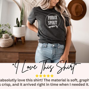 a woman wearing a t - shirt that says i love this shirt