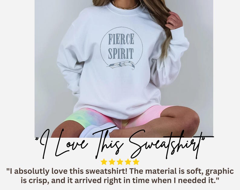 a woman wearing a white sweatshirt and pink shorts