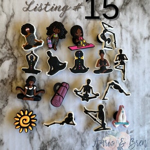May include: Listing #15: A set of 16 colorful yoga-themed shoe charms. The charms feature a variety of yoga poses, including downward dog, warrior one, and tree pose. There are also charms of a yoga mat, a sun, and a person in a yoga pose with the word "Namaste" written on it.