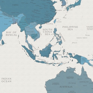 May include: A blue and white map of Southeast Asia and Australia. The map shows the countries and major cities in the region. The map is on a white background.