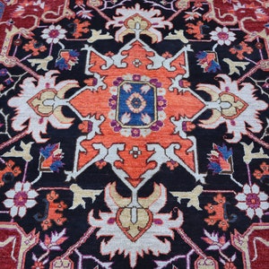 May include: A traditional Persian rug with a black background and intricate floral patterns in shades of red, orange, white, blue, and yellow.