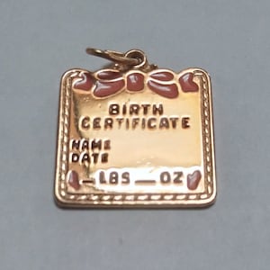 Veertien karaats geelgouden bedel geboorteakte