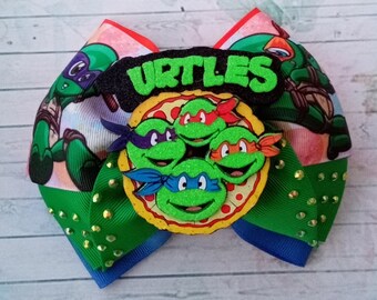 inspiré de l'arc de cheveux des tortues Ninja, des tortues ninja, des arcs de cheveux, des arcs de tortues ninja pour les filles.