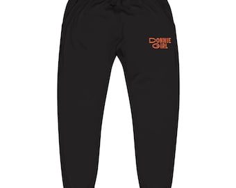 Pantalones deportivos tipo jogger de color naranja bordados, inspirados en el modelo Donnie Girl de New Kids.