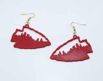 with a natural border. Chunky Collection square ear clips tomato-red