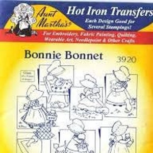 May include: A sheet of iron-on transfers featuring a design of a woman in a bonnet and dress. The design is repeated in various poses, including sitting, standing, and walking. The sheet is labelled "Bonnie Bonnet" and "3920".