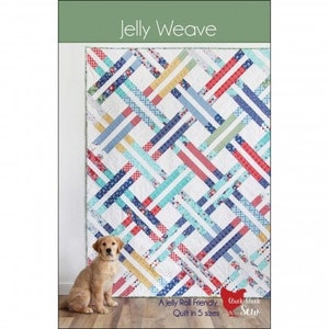 May include: A colorful quilt with a woven design, featuring red, blue, yellow, and green stripes on a white background. The quilt is labeled "Jelly Weave" and "A Jelly Roll Friendly Quilt in 5 sizes". A golden retriever puppy sits in front of the quilt.